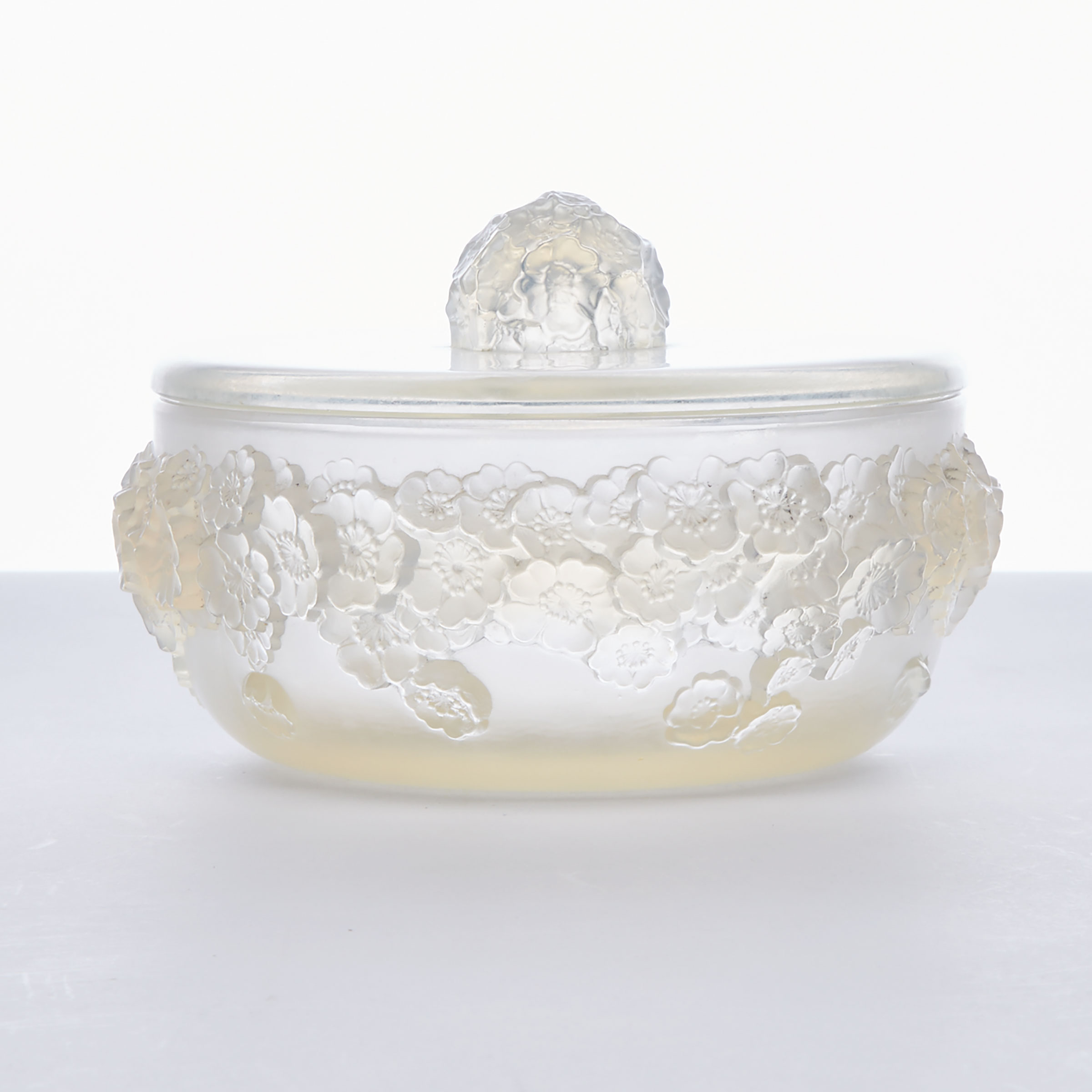 ‘Primevères’, Lalique Moulded and Partly Frosted Opalescent Glass Circular Covered Box, 1930s