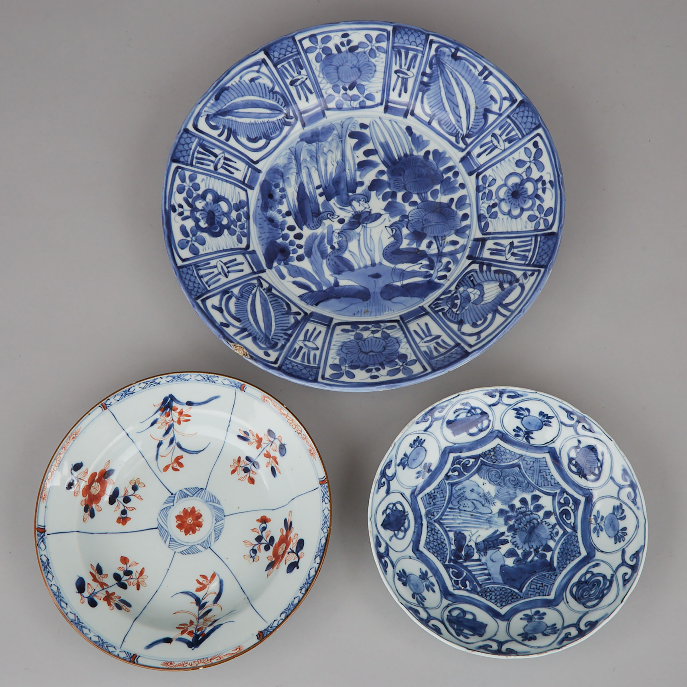 Japanese Export Blue and White Porcelain Charger and Two Chinese Plates, 17th-19th century