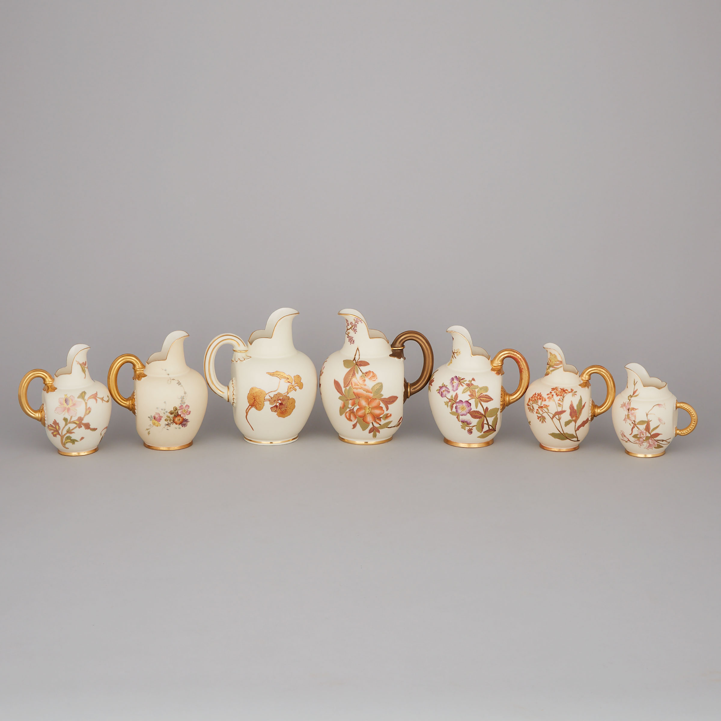 Seven Royal Worcester Blush Ivory Ground Flat Back Jugs, late 19th century