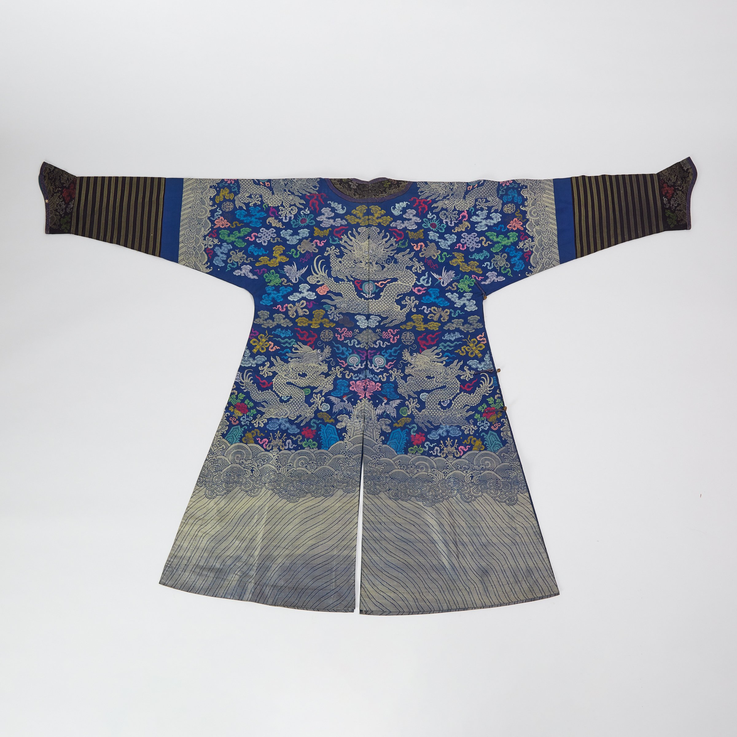 A Blue Ground Silk Embroidered Dragon Robe, Early 20th Century