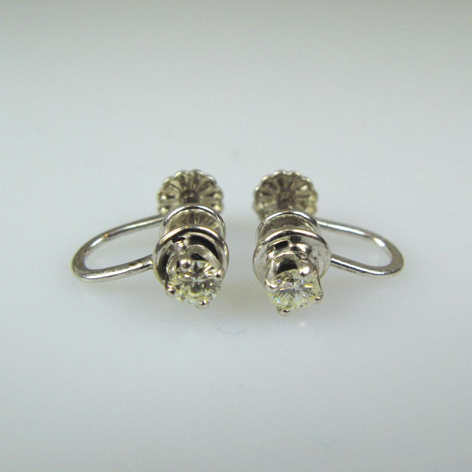 Pair of 14k white gold screw back earrings