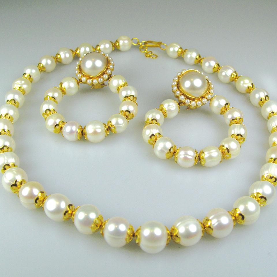 22k yellow gold and freshwater pearl necklace & earring suite