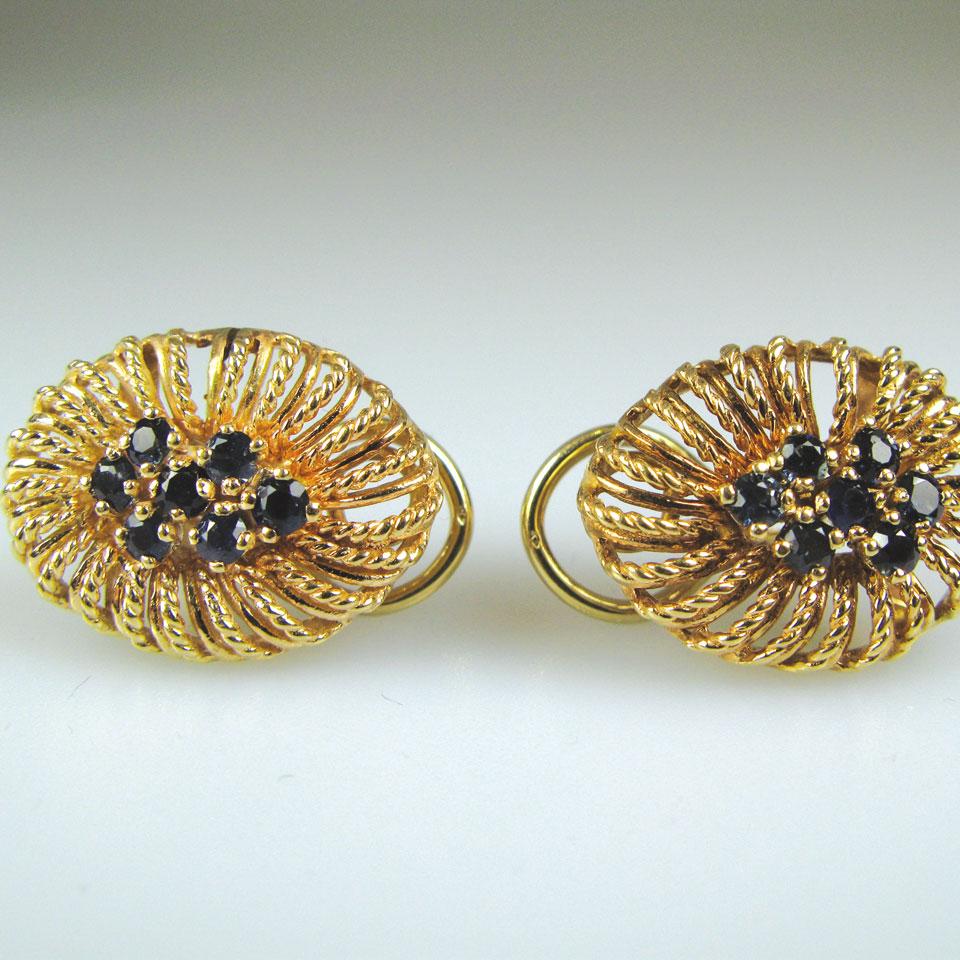 Pair of 14k yellow gold stud and clip back earrings