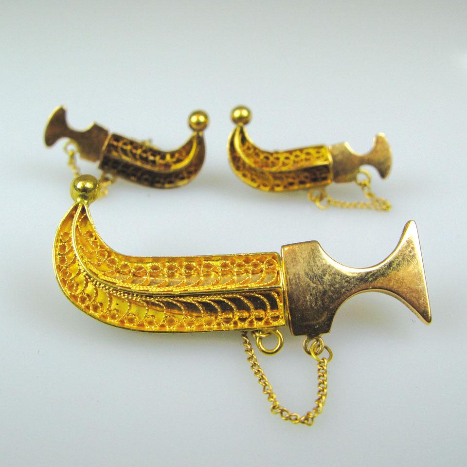 High karat Eastern gold dagger brooch