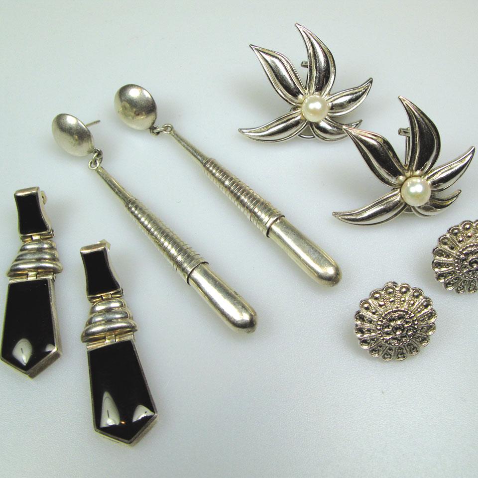 Seven various pairs of silver earrings