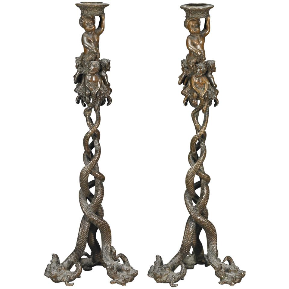 After Christophe Fratin (French, 1801-1864), Pair of Patinated Bronze Satyr and Serpent Form Candlesticks