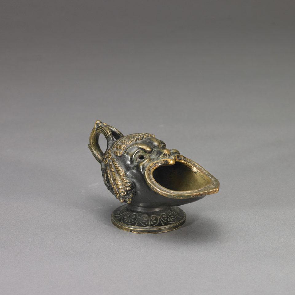 After the Ancient, Small Grand Tour Bronze Oil Lamp Modelled as Greek Theatrical Character Mask, 19th century
