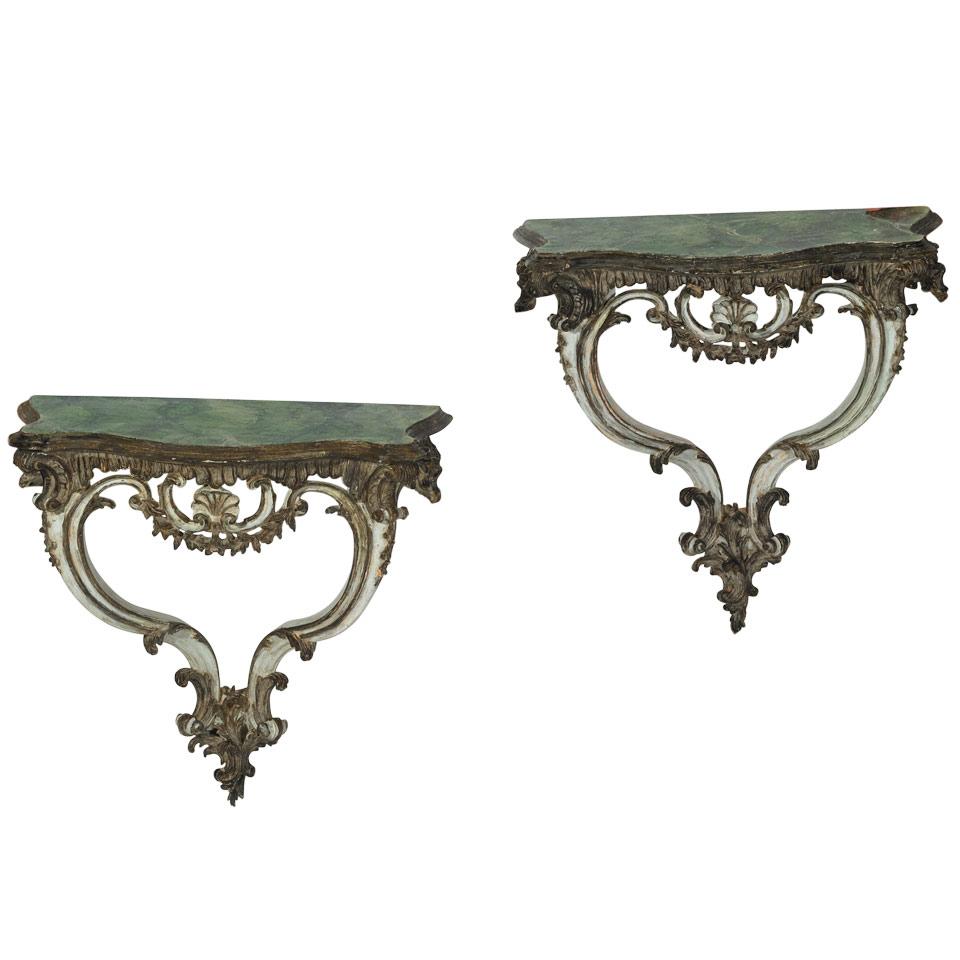 Pair of Italian Carved and Silvered Wood Console Tables