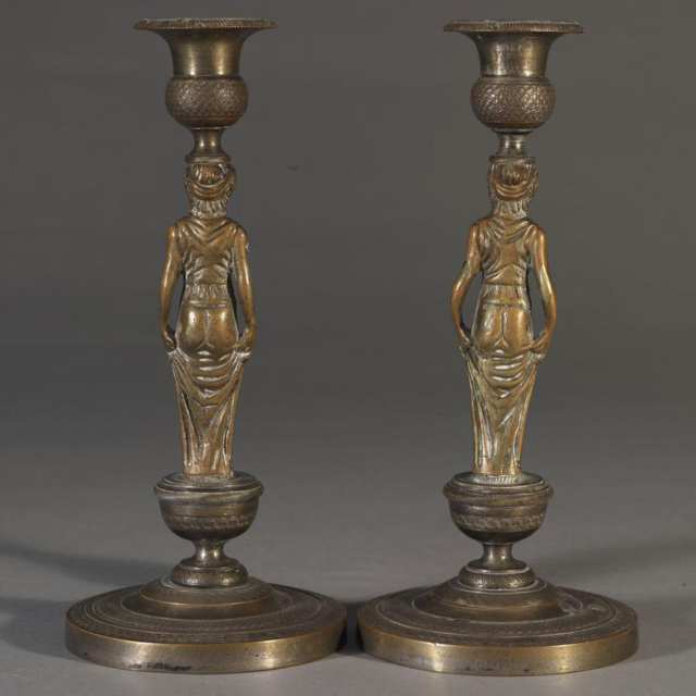 Pair of French Restauration Silvered Bronze Figural Candlesticks, early 19th century