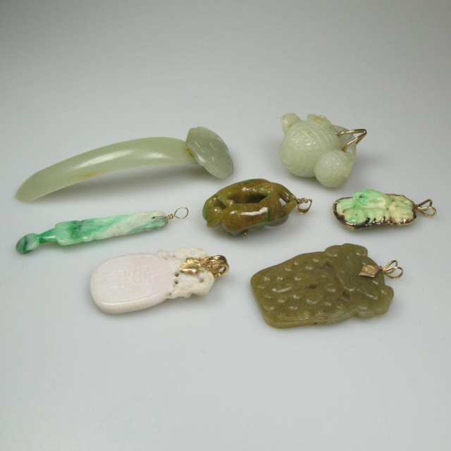 Seven Various Carved Jade and Jadeite Pendants