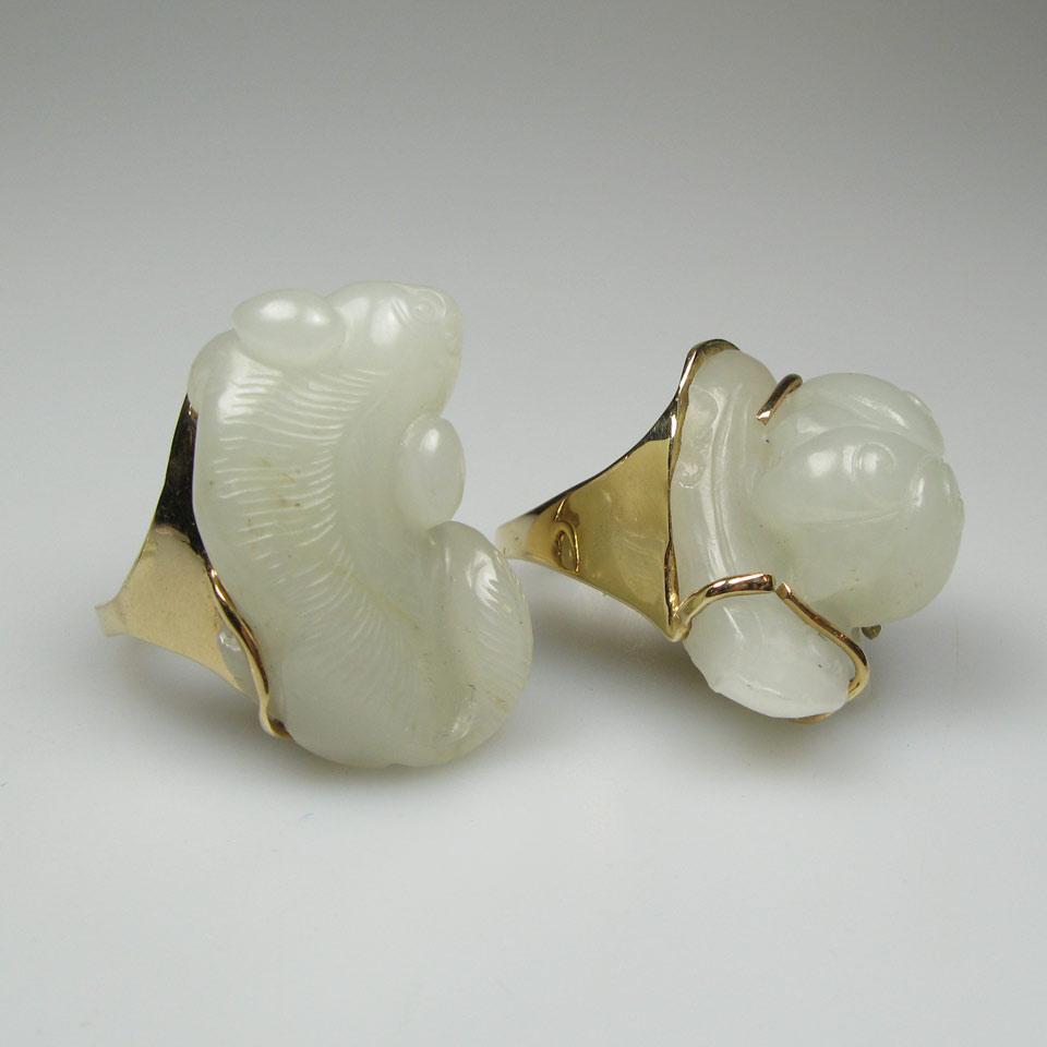 Two Carved Pale Celadon Jade Pebbles