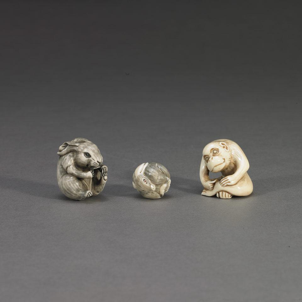 Two Ivory Netsukes together with an Ivory Bead