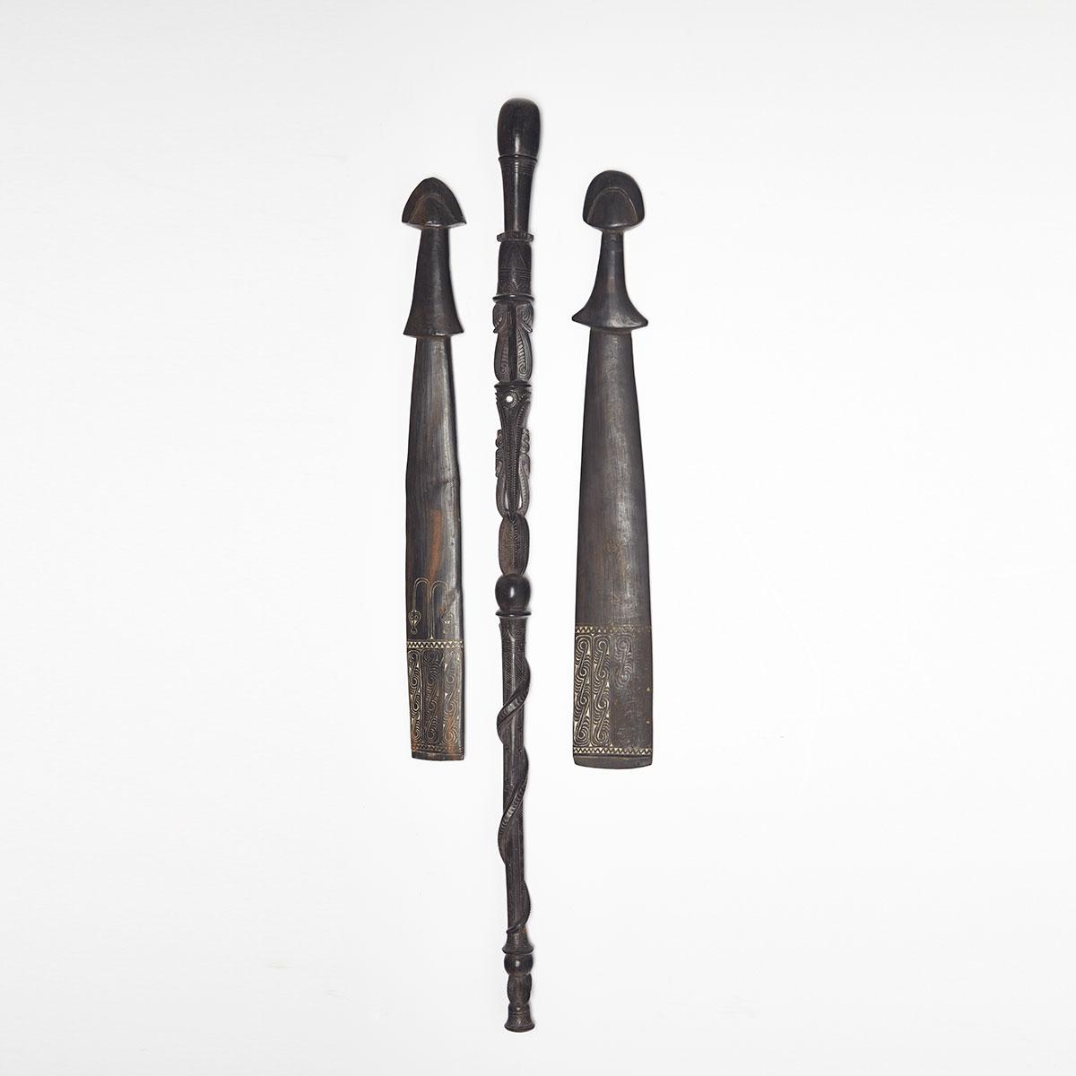 Two Papua New Guinea Trobriand Islands Massim Sword Clubs and an Orator’s Staff, early 20th century