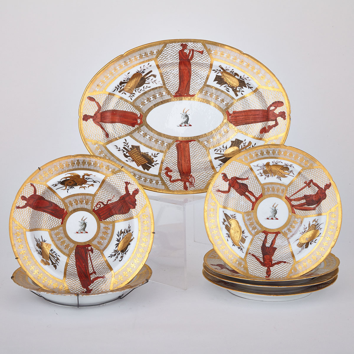 Four Coalport Armorial Plates, Two Soup Plates and a Platter, c.1805-10