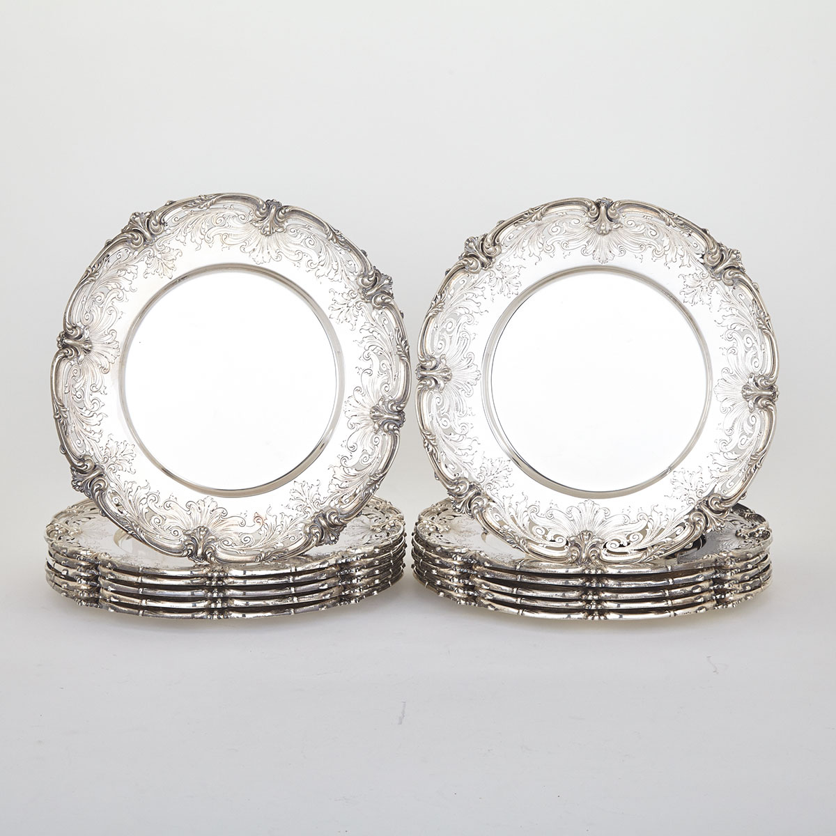 Set of Twelve American Silver Dinner Plates,  Redlich & Co., New York, N.Y., 20th century