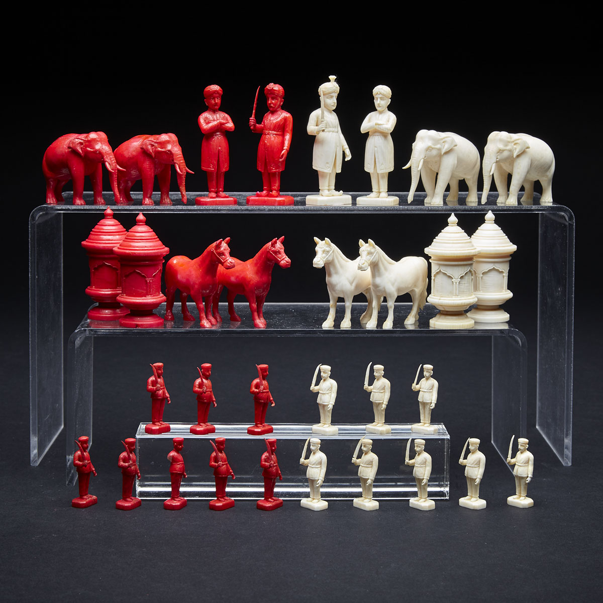 Indian Carved Ivory Figural and Animal Form Chess Set, 19th century