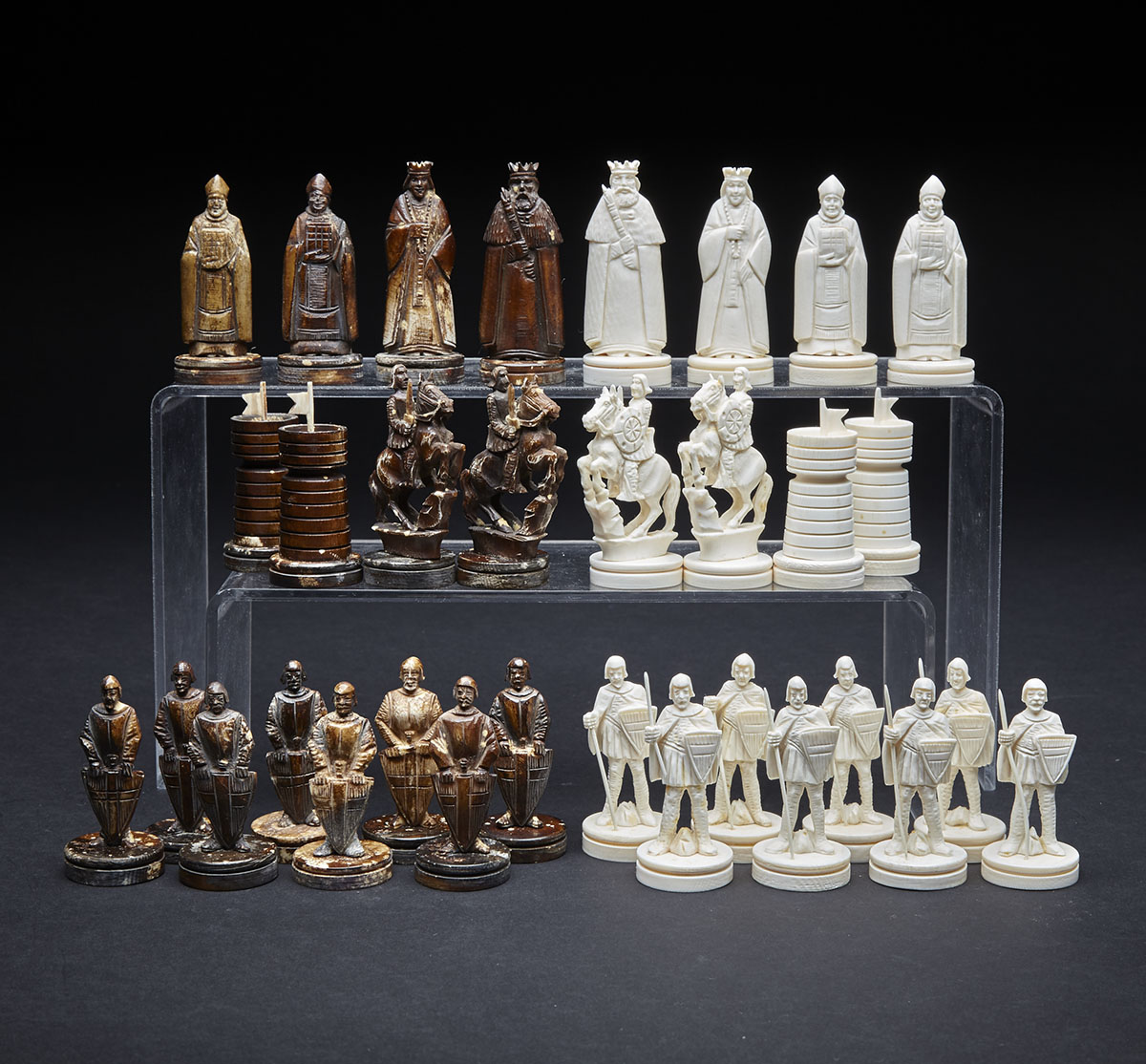German Carved Ivory Mediaeval Style Figural Chess Set, early 20th century