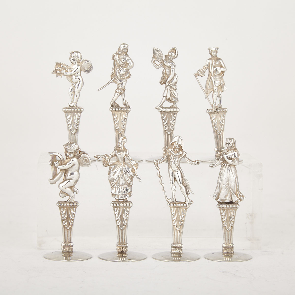 Eight French Silver Figural Place Card Holders, Ernest Eschwége, Paris, early 20th century
