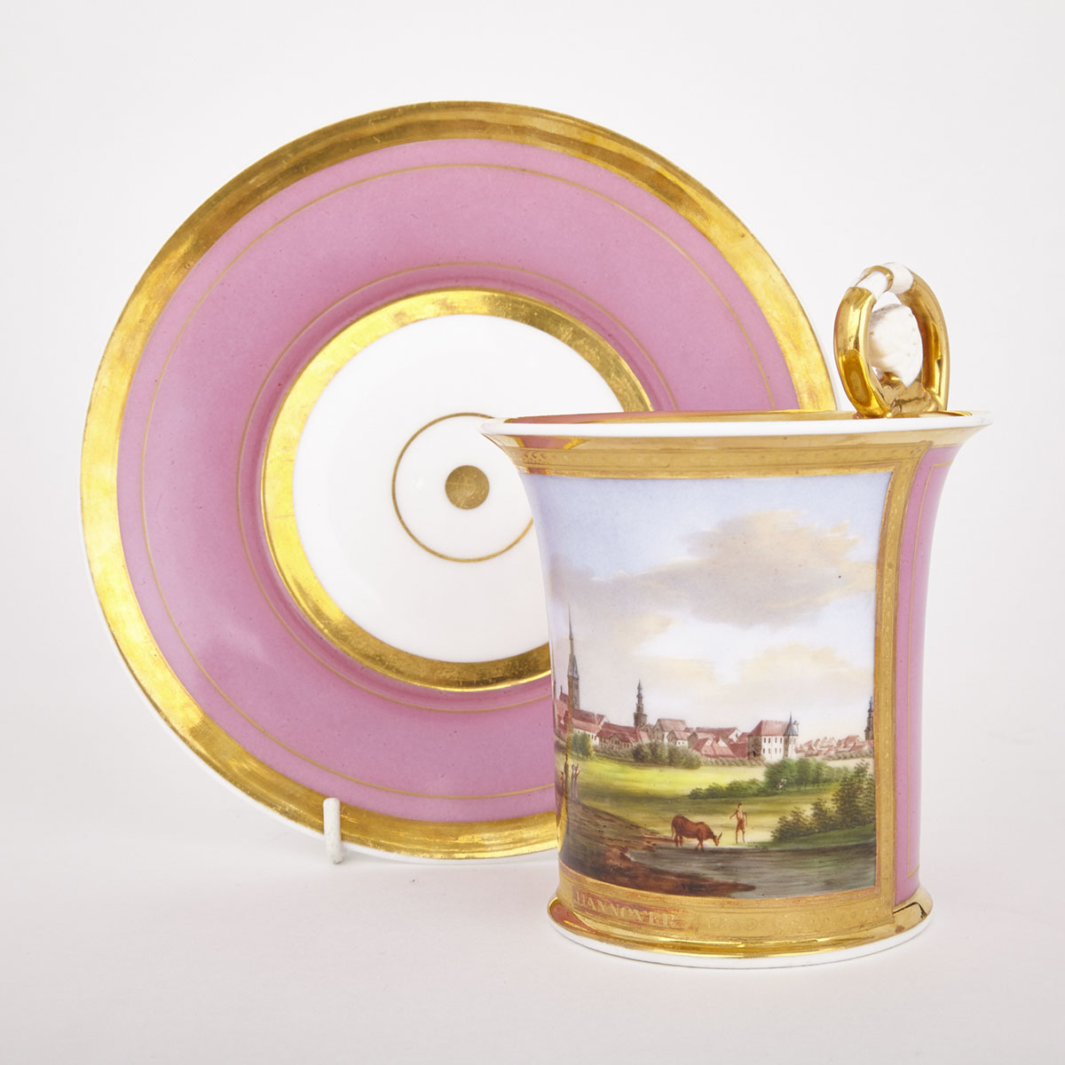 Paris Porcelain Topographical Pink Ground Cup and Saucer, mid-19th century