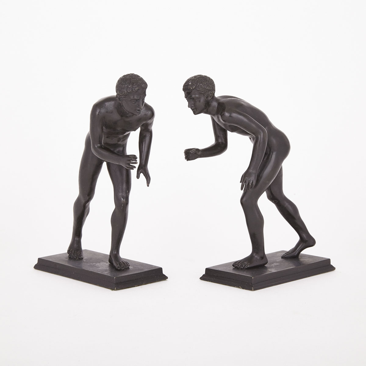Pair of ‘Grand Tour Souvenir’ Patinated Bronze Figures of Wrestlers, After the Ancient, 19th century