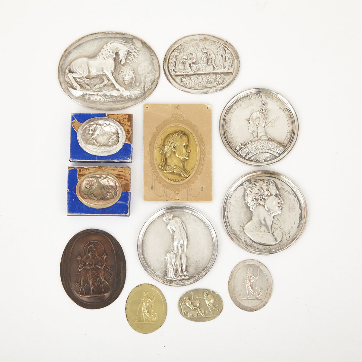 Collection of 12 Electrotype Silvered and Gilt Copper Relief Medallions, mid 19th century
