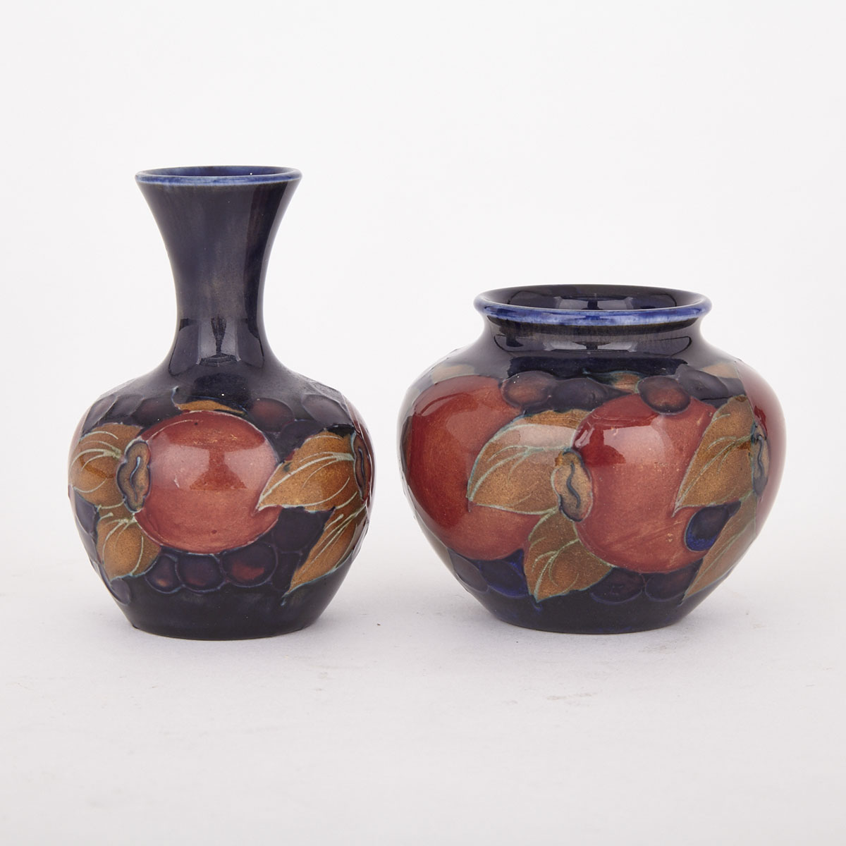 Two Moorcroft Pomegranate Small Vases, 1920s