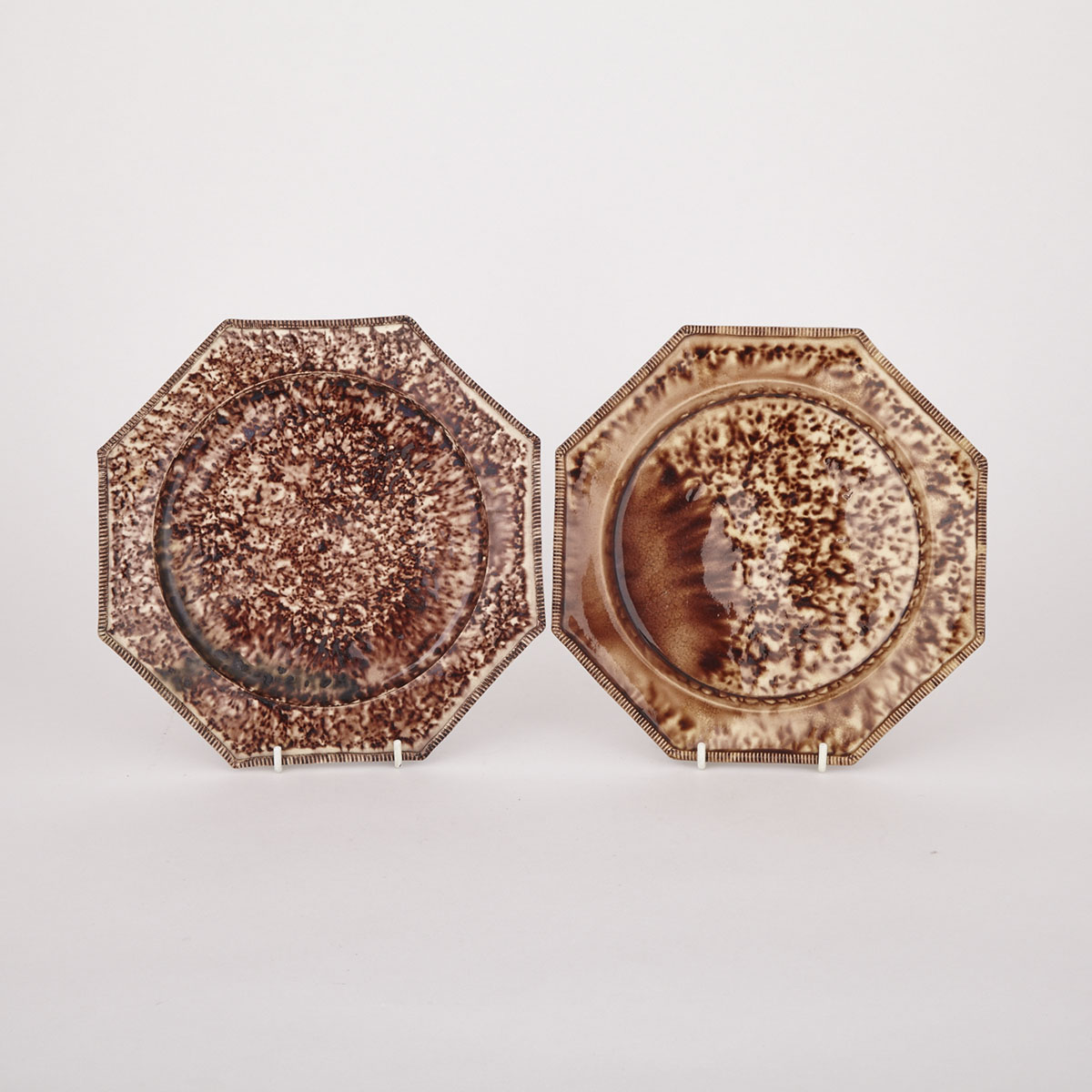 Two Staffordshire Octagonal Tortoiseshell-Glazed Creamware Plates, c.1750-60