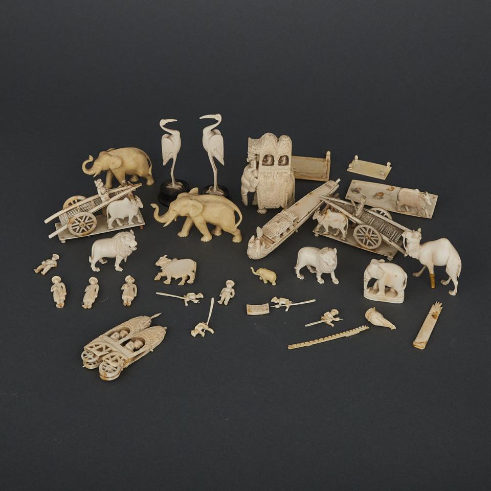 A Group of Small Ivory and Ivorine Figures 