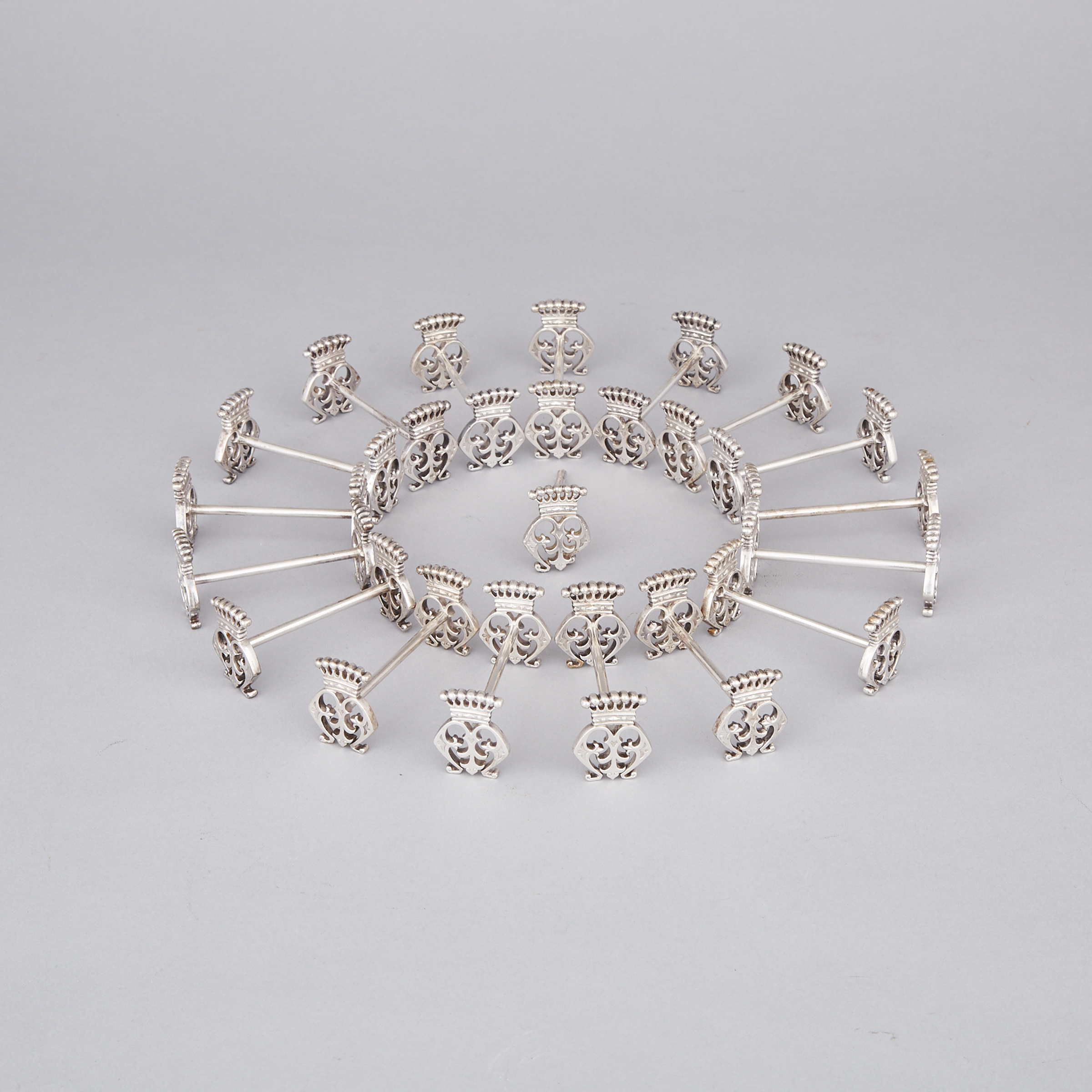 Eighteen German Silver Crowned-Cipher Knife Rests, late 19th/early 20th century