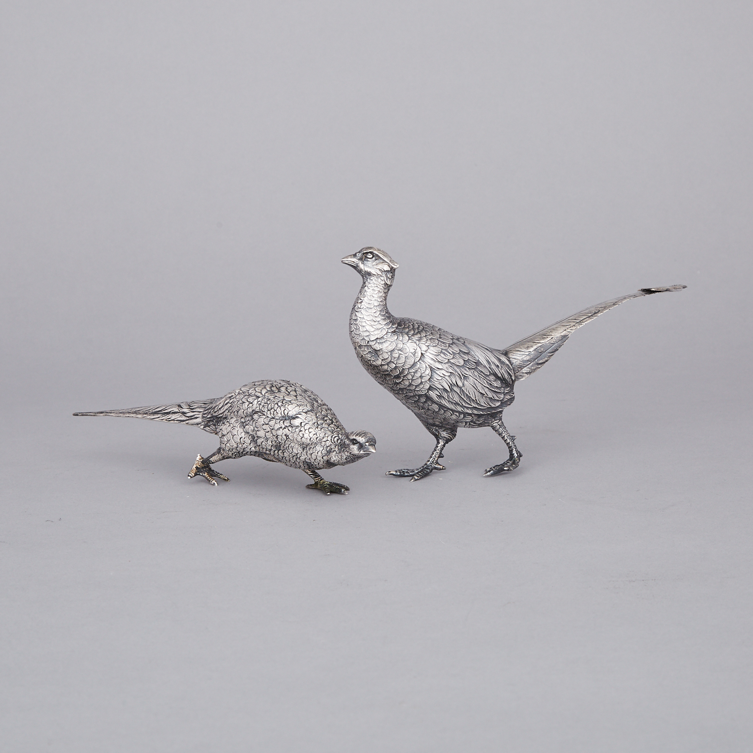 Pair of German Silver Models of Pheasants, early 20th century