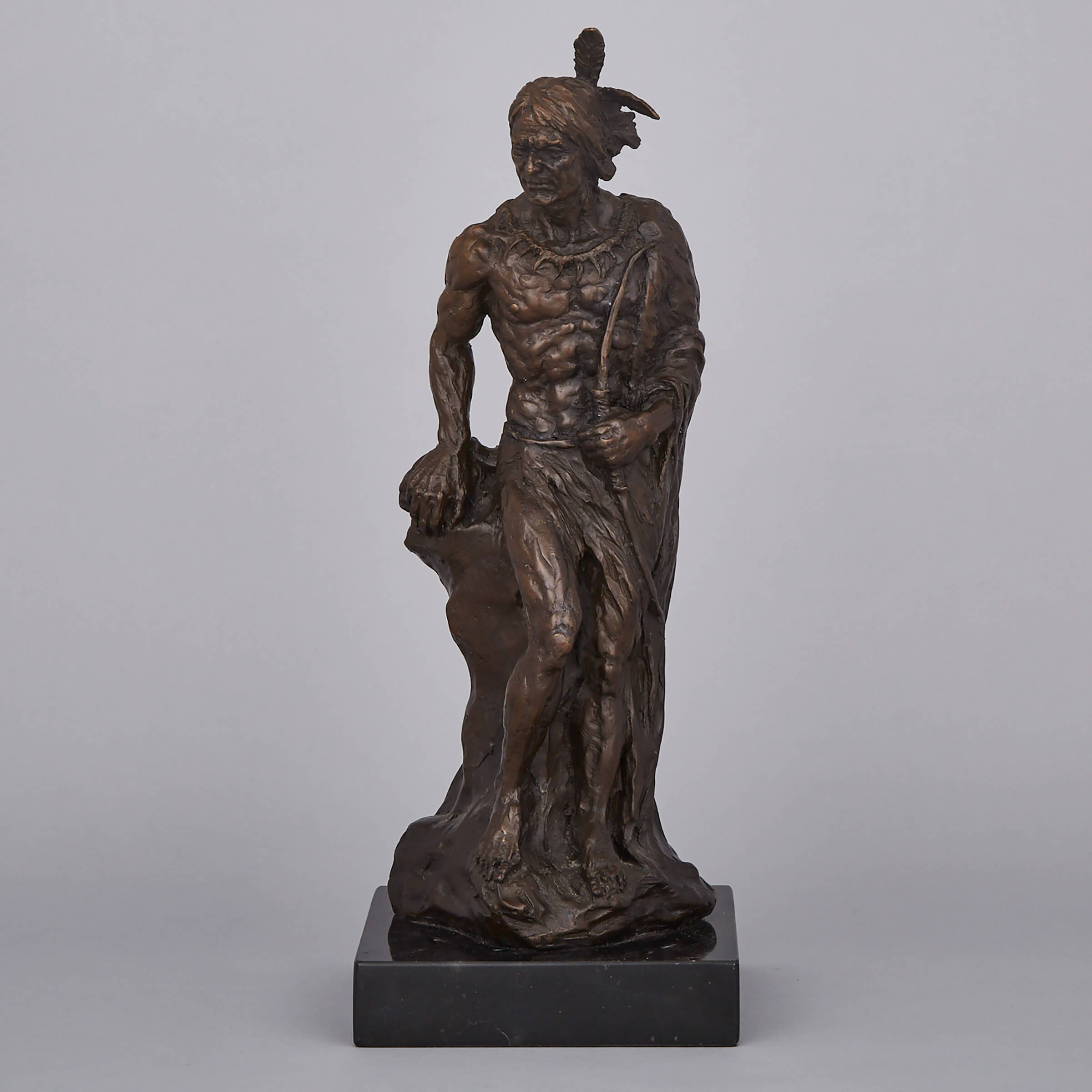 Patinated Bronze FIgure of a Native American Indian, 20th century