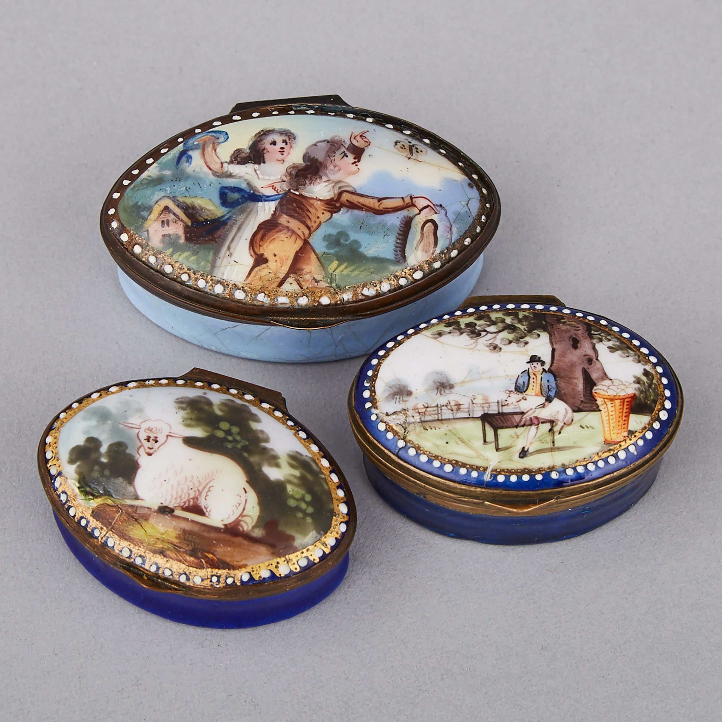 Two Bilston Enamel Snuff Boxes and a Patch Box, late 18th/early 19th century