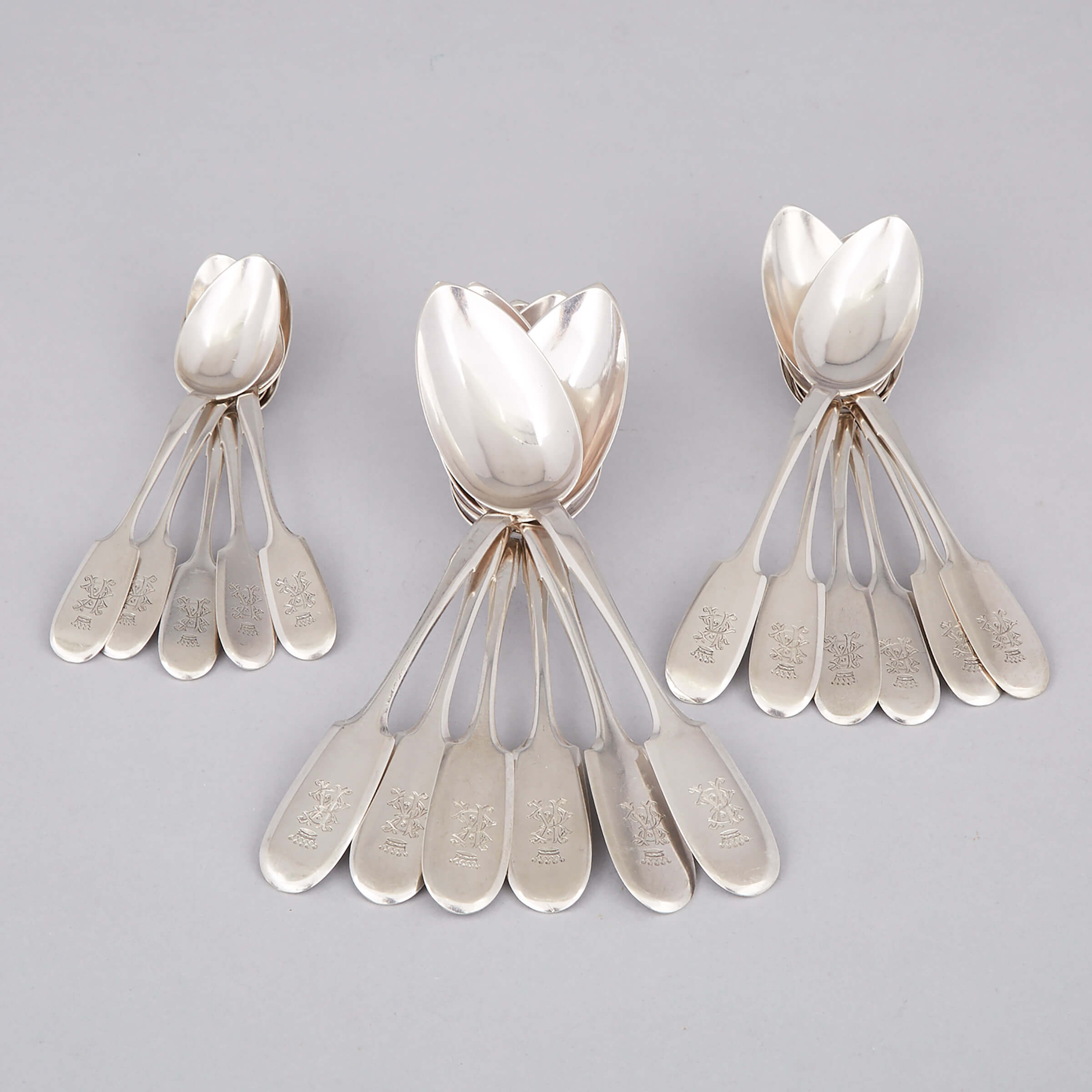 Six Russian Silver Fiddle Pattern Table Spoons, Six Dessert Spoons and Five Tea Spoons, St. Petersburg, c.1808-17