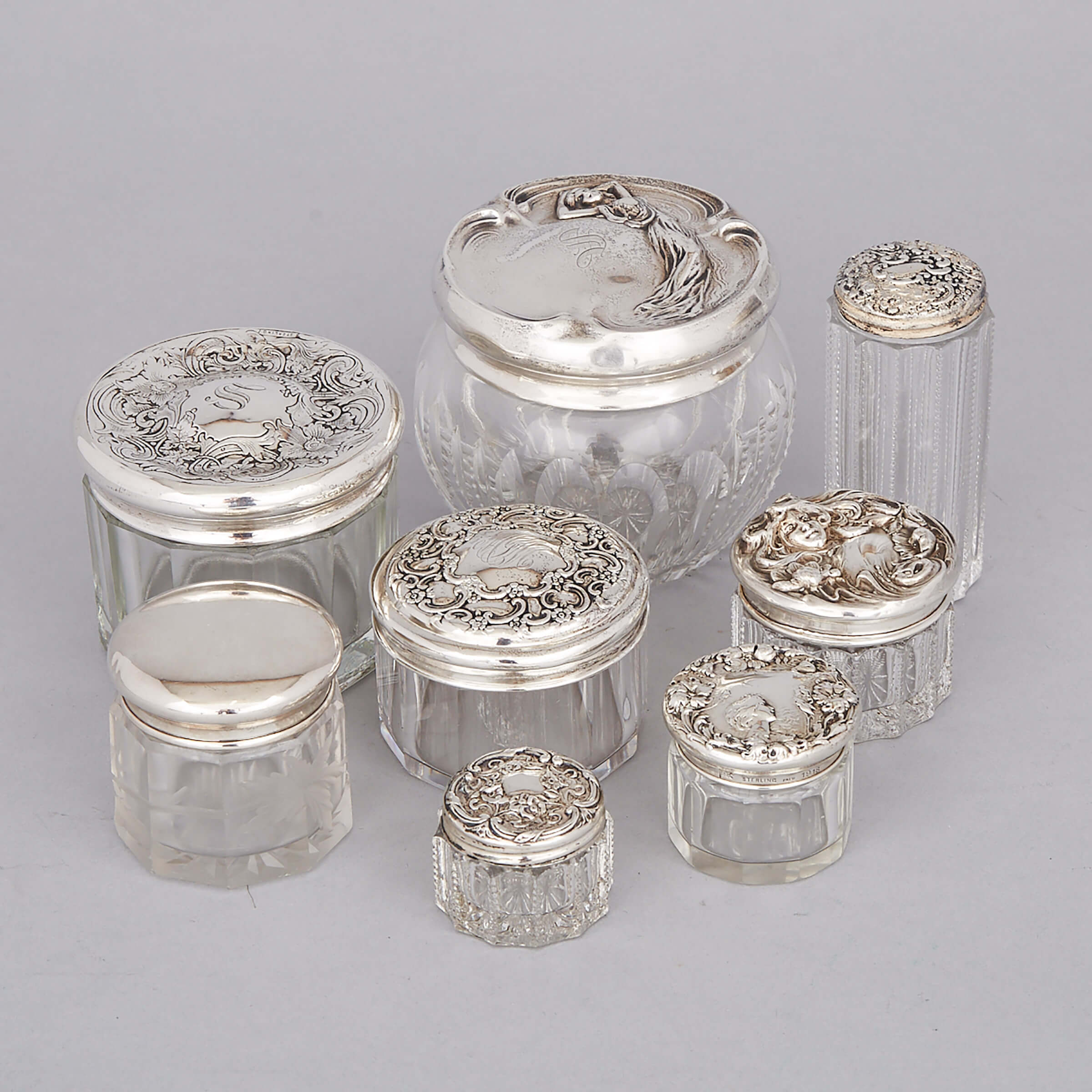 Eight North American Silver and Cut Glass Dressing Table Jars, c.1900-10