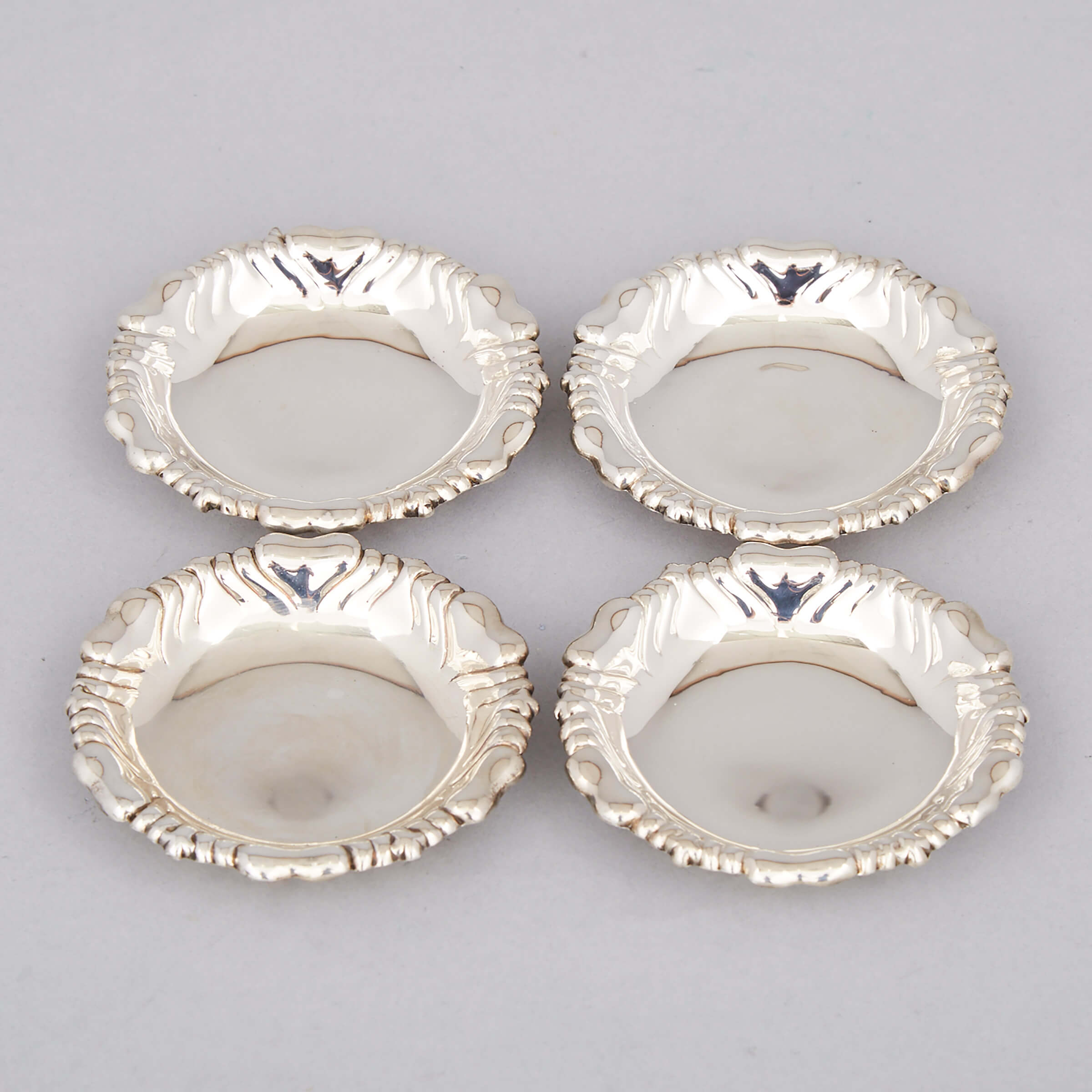 Four American Silver Circular Nut Dishes, Tiffany & Co., New York, N.Y., c.1891-1902