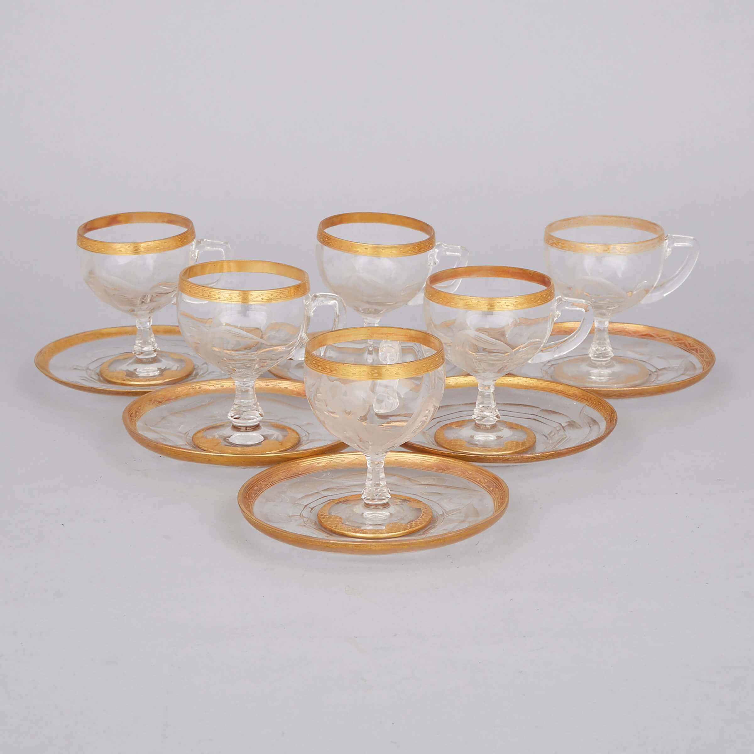 Six Continental Engraved and Gilt Glass Cups with Stands, late 19th century