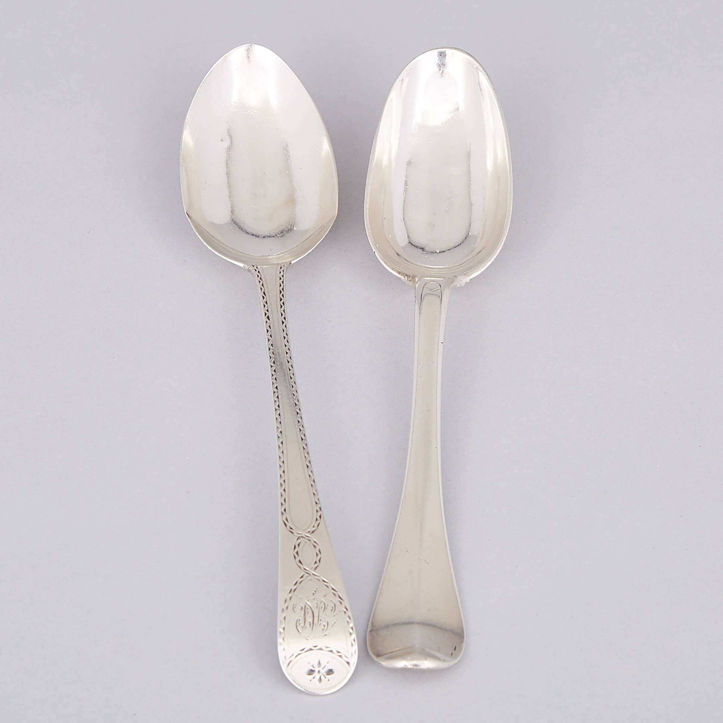 George III Silver Bright-Cut Table Spoon, Hester Bateman, London, 1779, and another, French, Bordeaux, c.1700