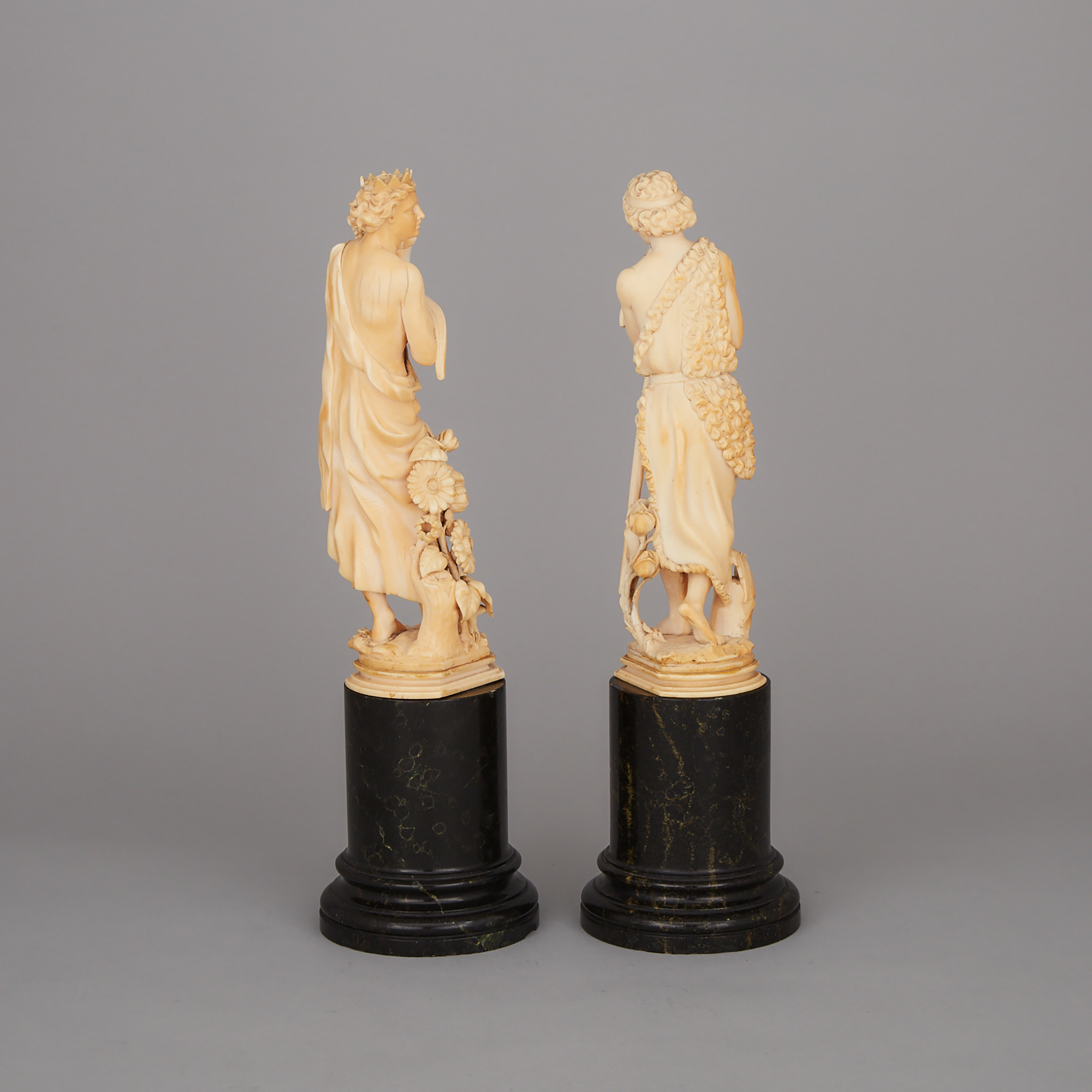 Pair of Continental Carved Ivory Allegorical Figures, 19th century