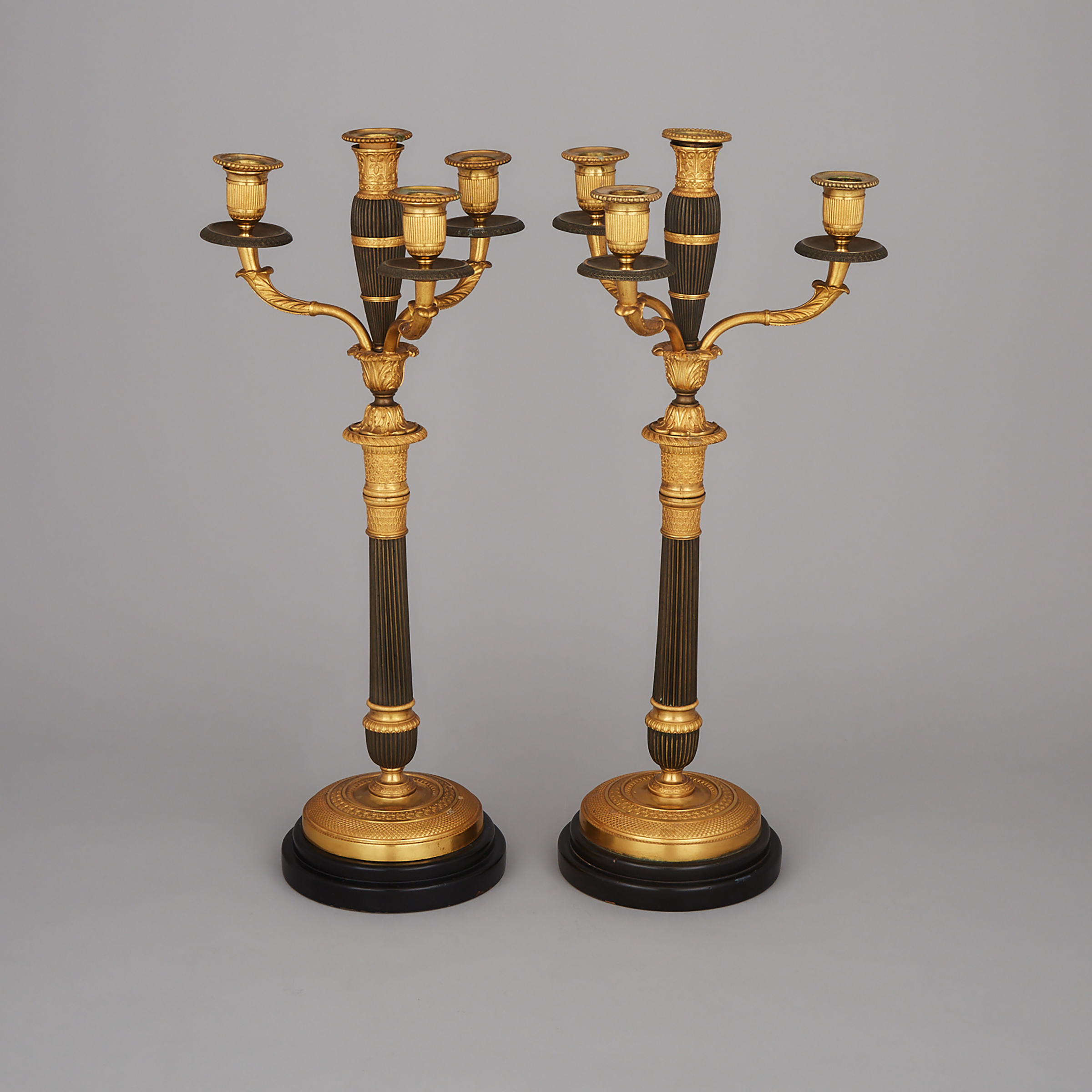 Pair of French Empire Gilt and Patinated Bronze Candelabra, 19th century